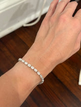 White gold east west set 14.02ct emerald cut lab diamond bracelet