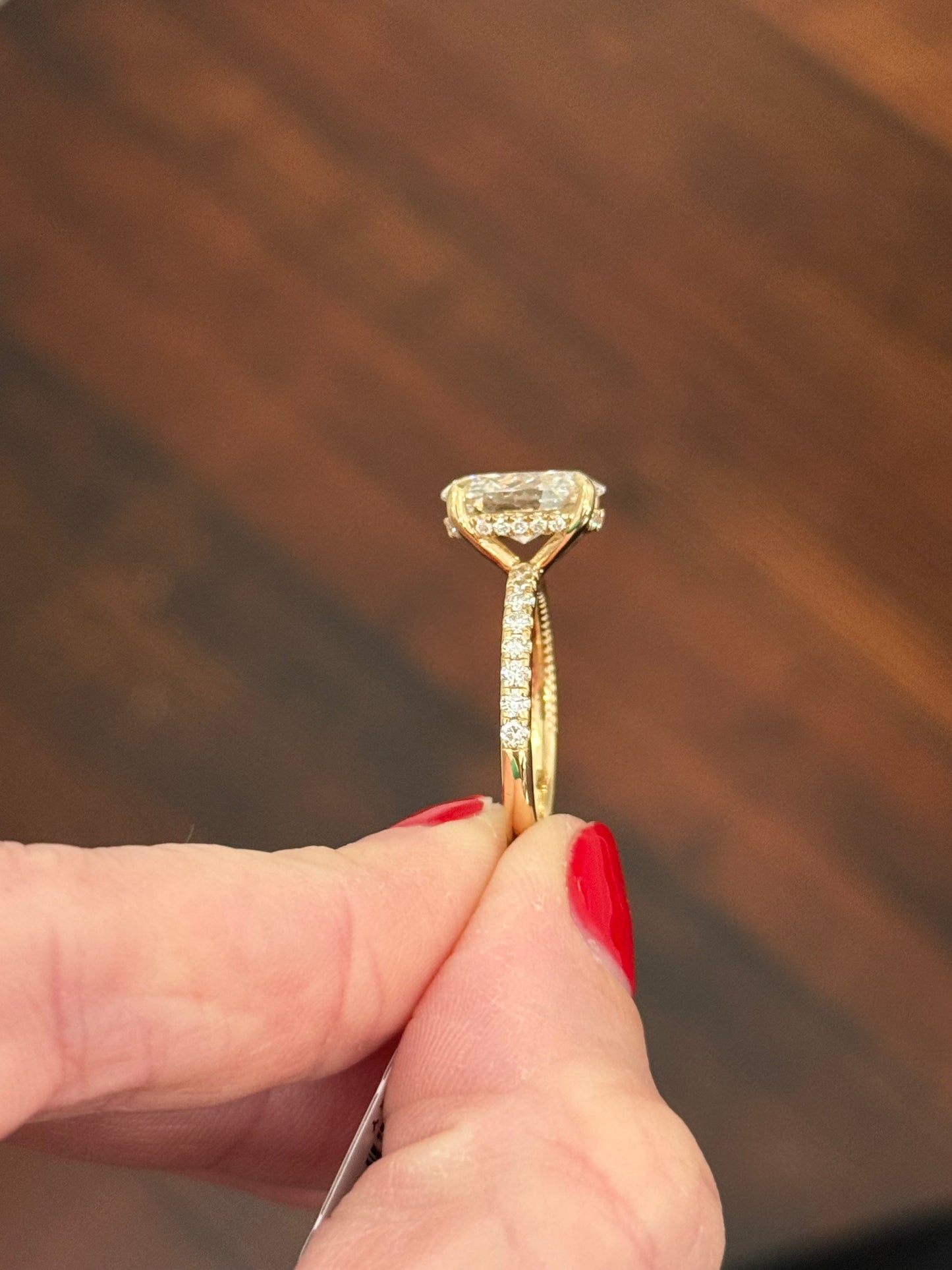 Yellow gold oval lab diamond ring. Center stone is IGI certified and 3.02cts E VVS2