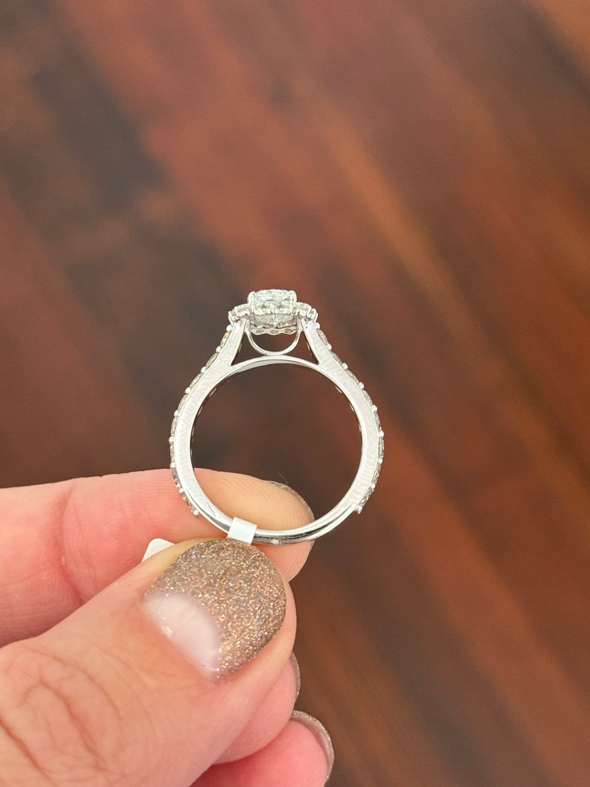 White gold cushion and round lab diamond ring. Center stone is 1ct and 7.1x4.8mm