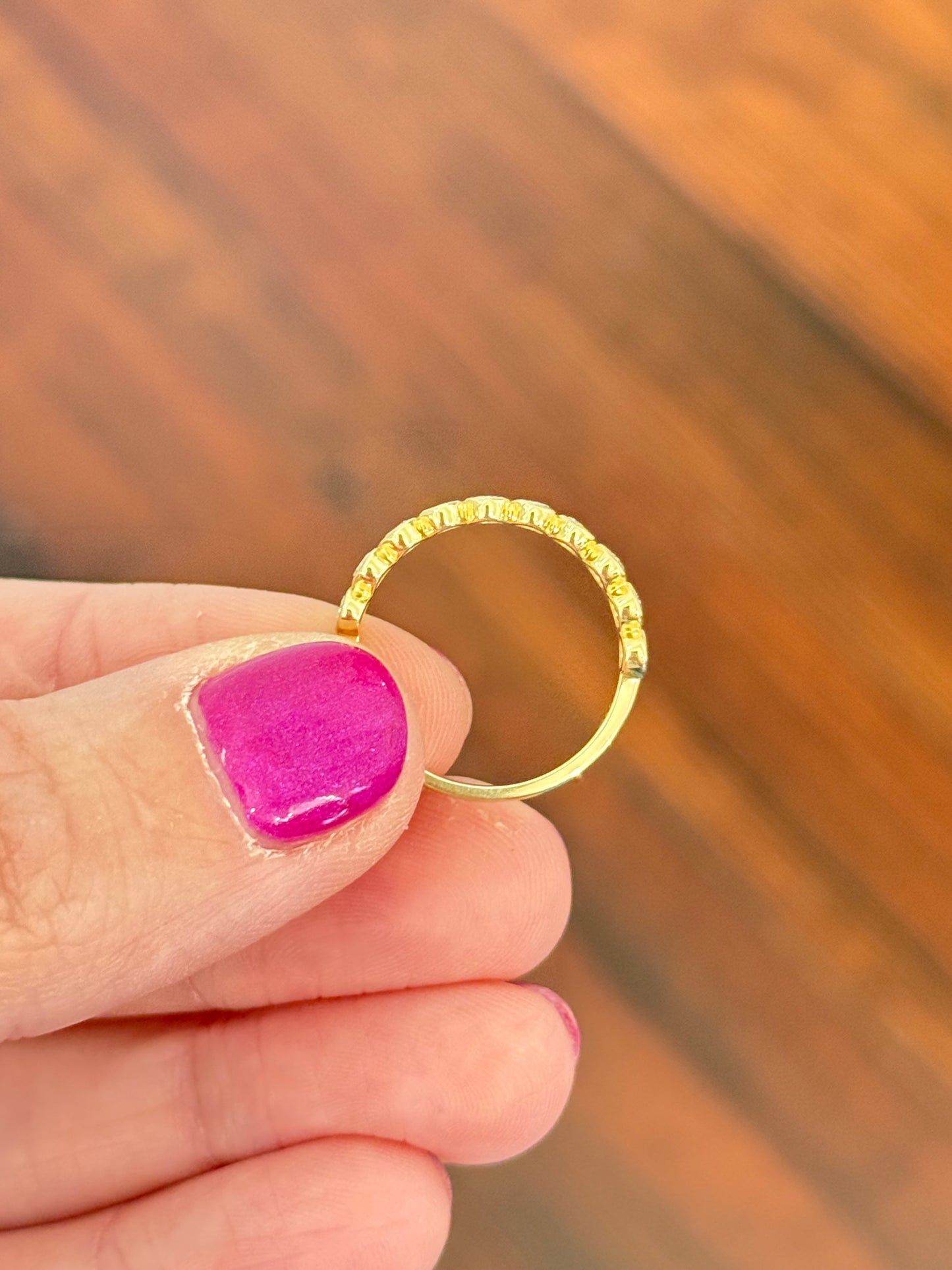 Yellow gold bezel set oval lab diamond band