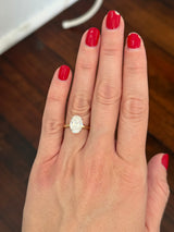 Yellow gold IGI certified oval lab diamond ring. Lab diamond is set in white gold