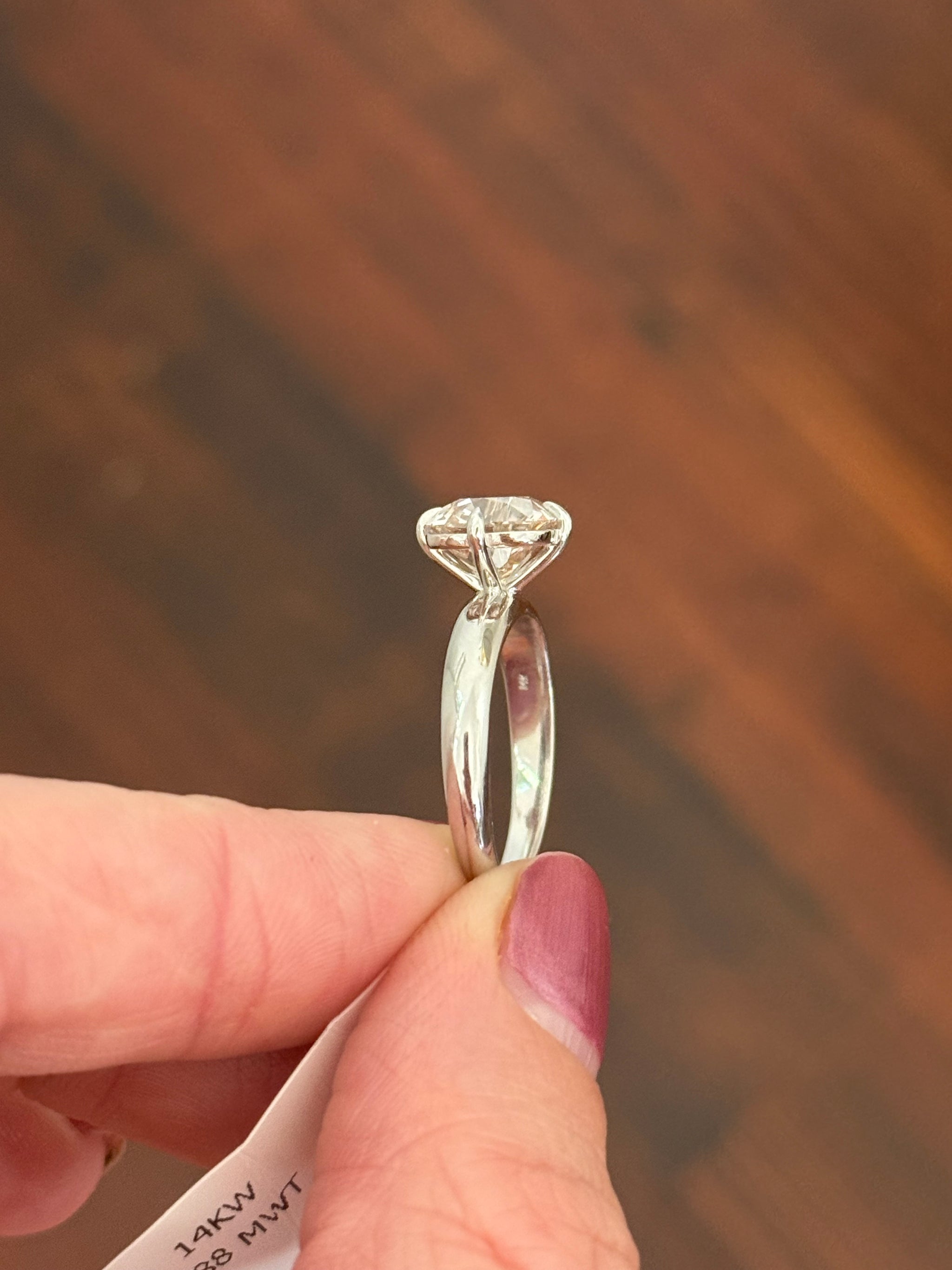 White gold 3.02ct cushion cut lab diamond ring. Stone measures approximately 8.2mm