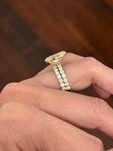 Yellow gold oval and round lab diamond ring and band set. Center stone is 6.58cts