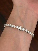 White gold half bezel set 9.74ct lab diamond bracelet