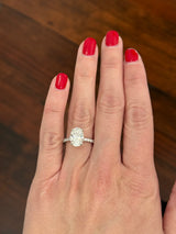 White gold oval lab diamond ring. Center stone is IGI certified and 3.03cts E VVS2