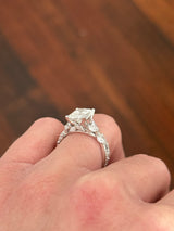 White gold radiant, marquise and round lab diamond ring. Center stone is 3.06cts E VS1 and measures 9.7x6.6mm