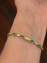 Yellow gold natural emerald and diamond bracelet