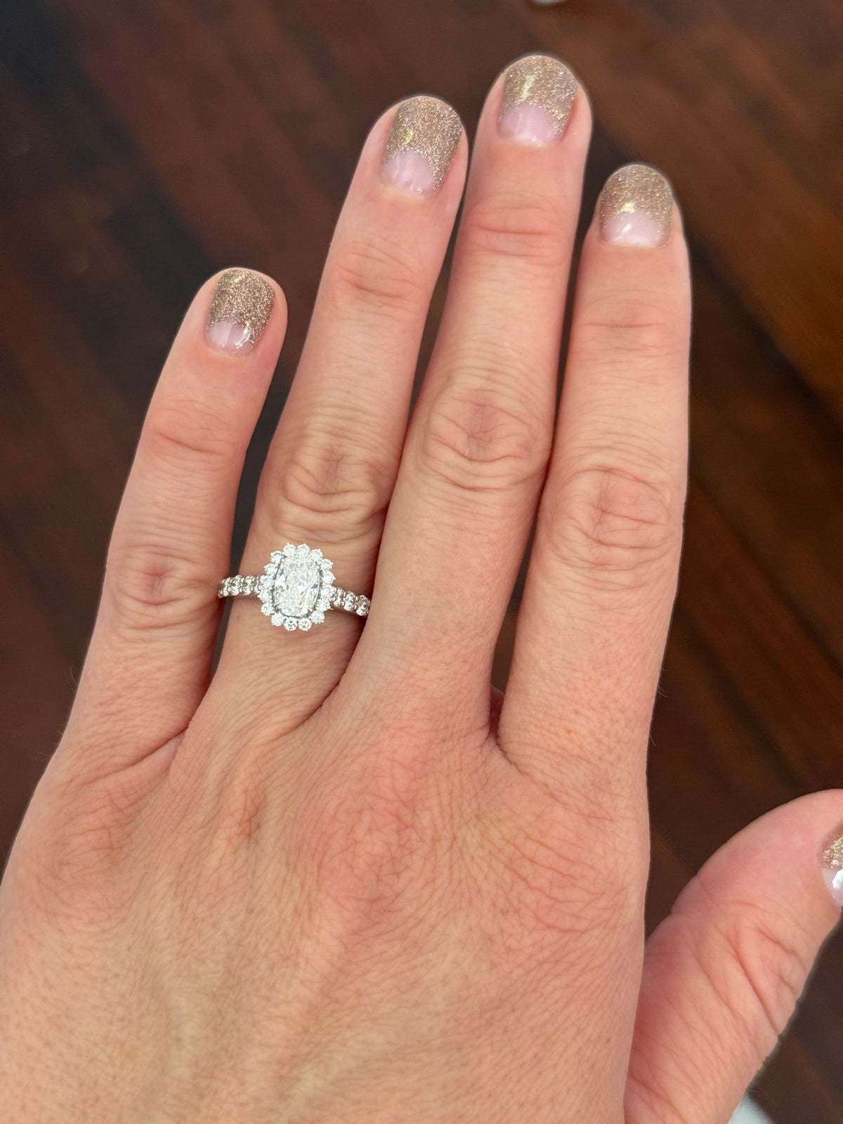 White gold cushion and round lab diamond ring. Center stone is 1ct and 7.1x4.8mm