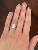 White gold cushion and round lab diamond ring. Center stone is 1ct and 7.1x4.8mm