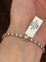 4 prong white gold 4.99ct orange and white lab diamond tennis bracelet