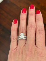 White gold oval lab diamond ring. Center stone is IGI certified and 3.07cts E VVS2