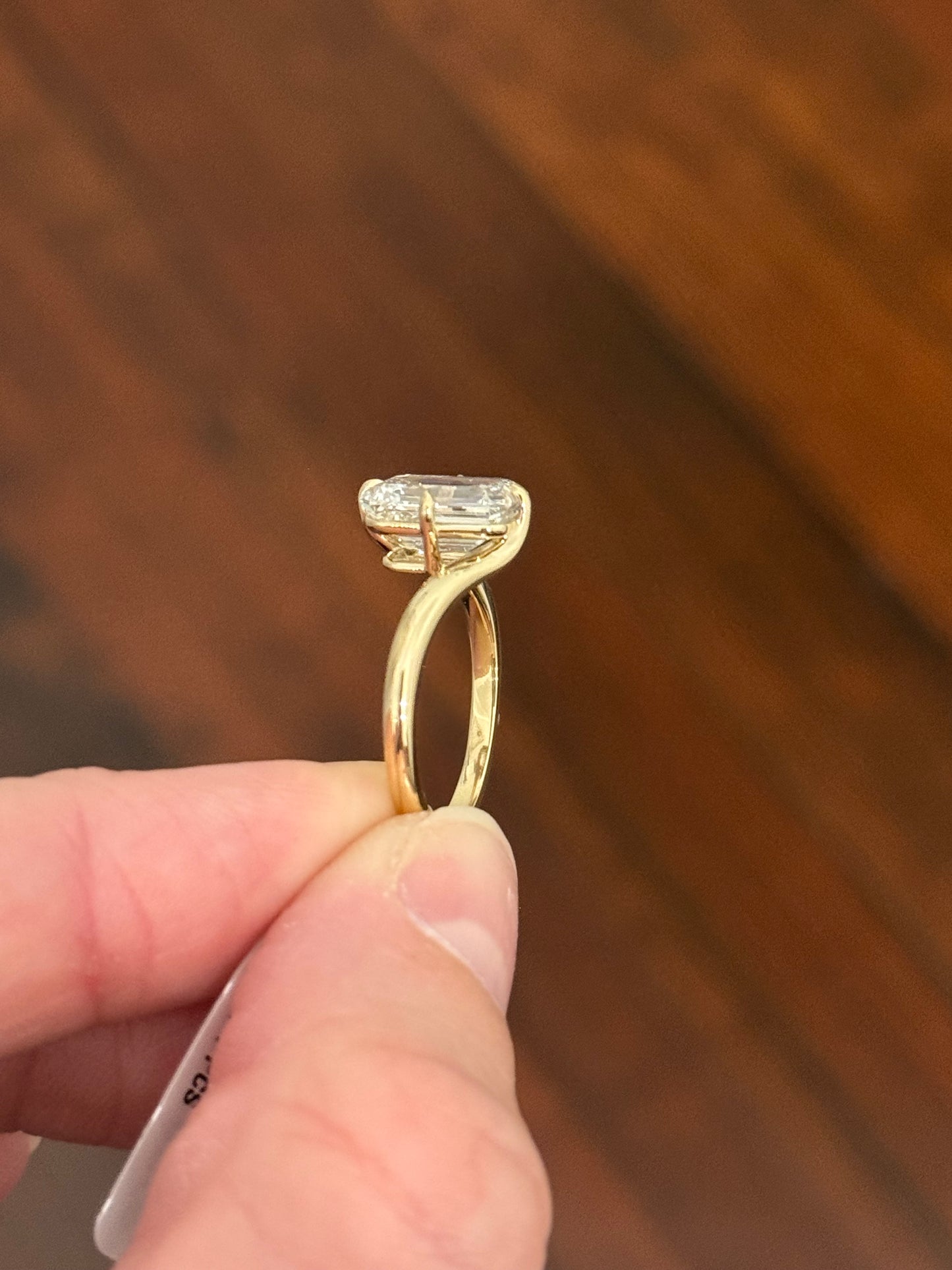 Yellow gold IGI certified 3.03ct emerald cut lab diamond ring