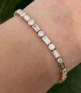 Yellow gold with white gold bezel setting 4.85ct baguette and round natural diamond bracelet