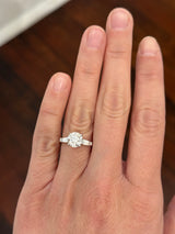 White gold IGI certified 2.04ct round lab diamond and tapered baguette lab diamond ring. Round measures 8.08x5.04mm