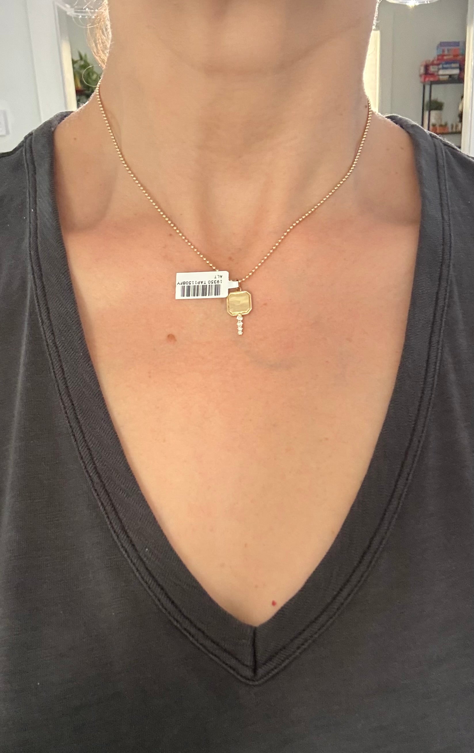 Natural diamond key pendants available in yellow or rose gold