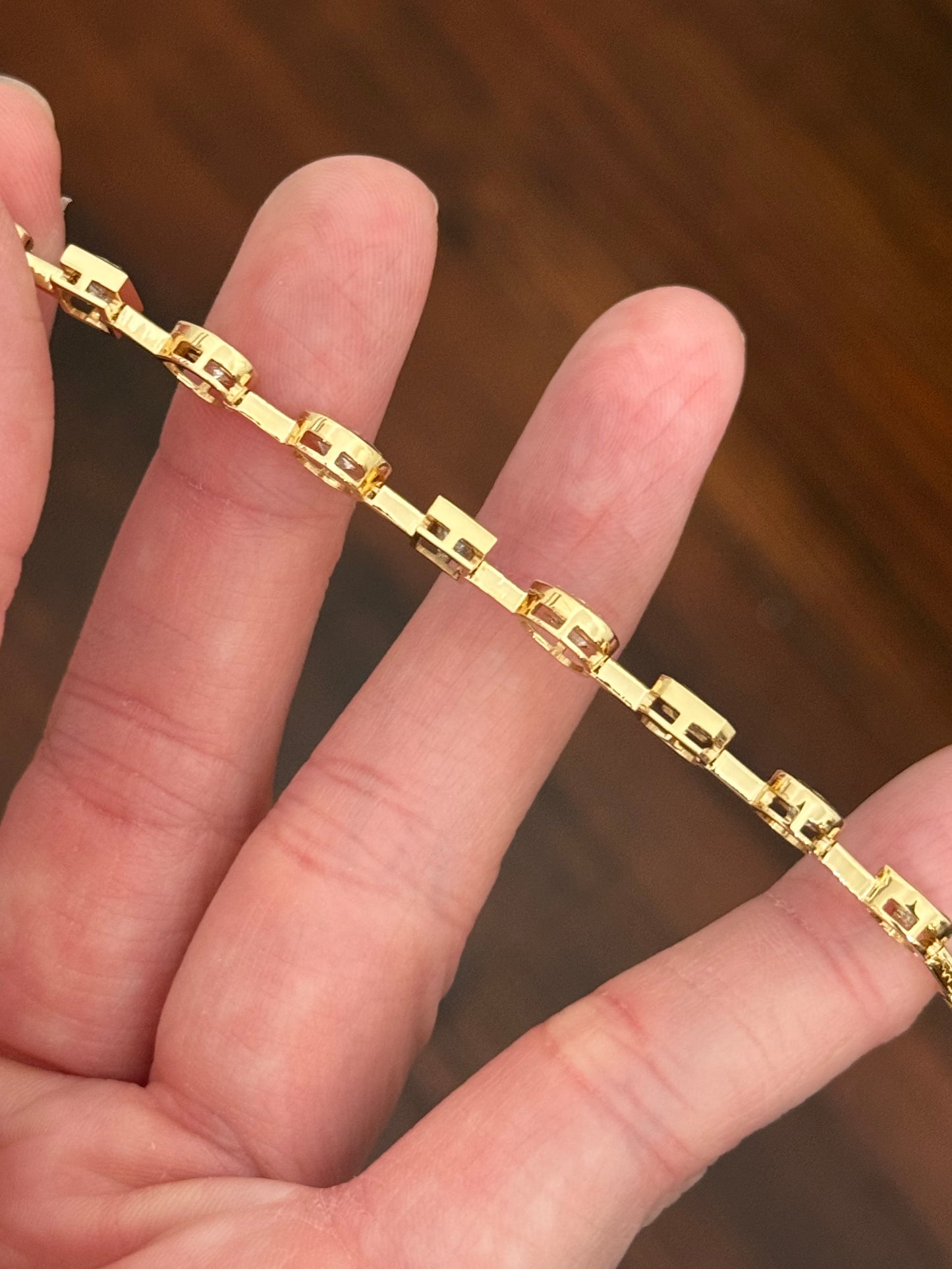 Yellow gold bezel set 7.44ct mixed shaped bracelet with oval, pear shape, marquise, princess and emerald cut natural diamonds