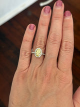 White gold oval lab diamond and white lab diamond ring