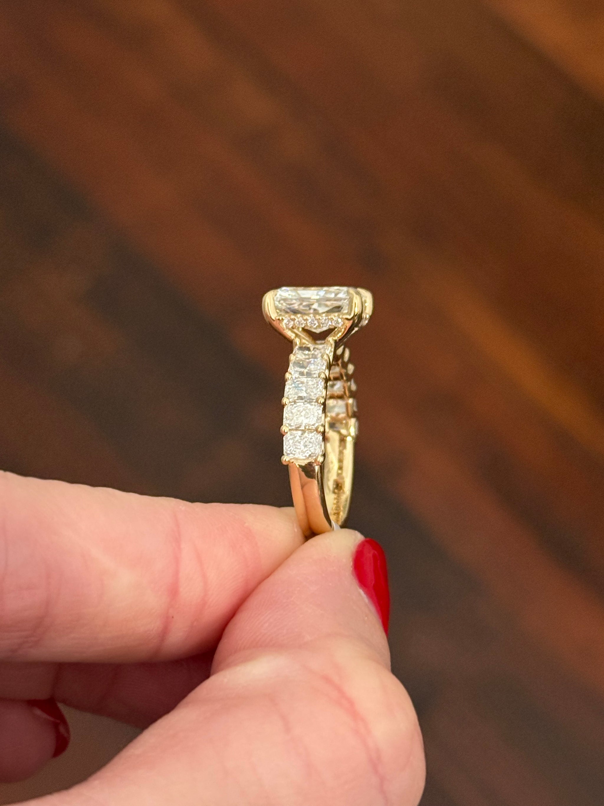Yellow gold radiant lab diamond ring. Center stone is IGI certified and 3.01cts E VVS2