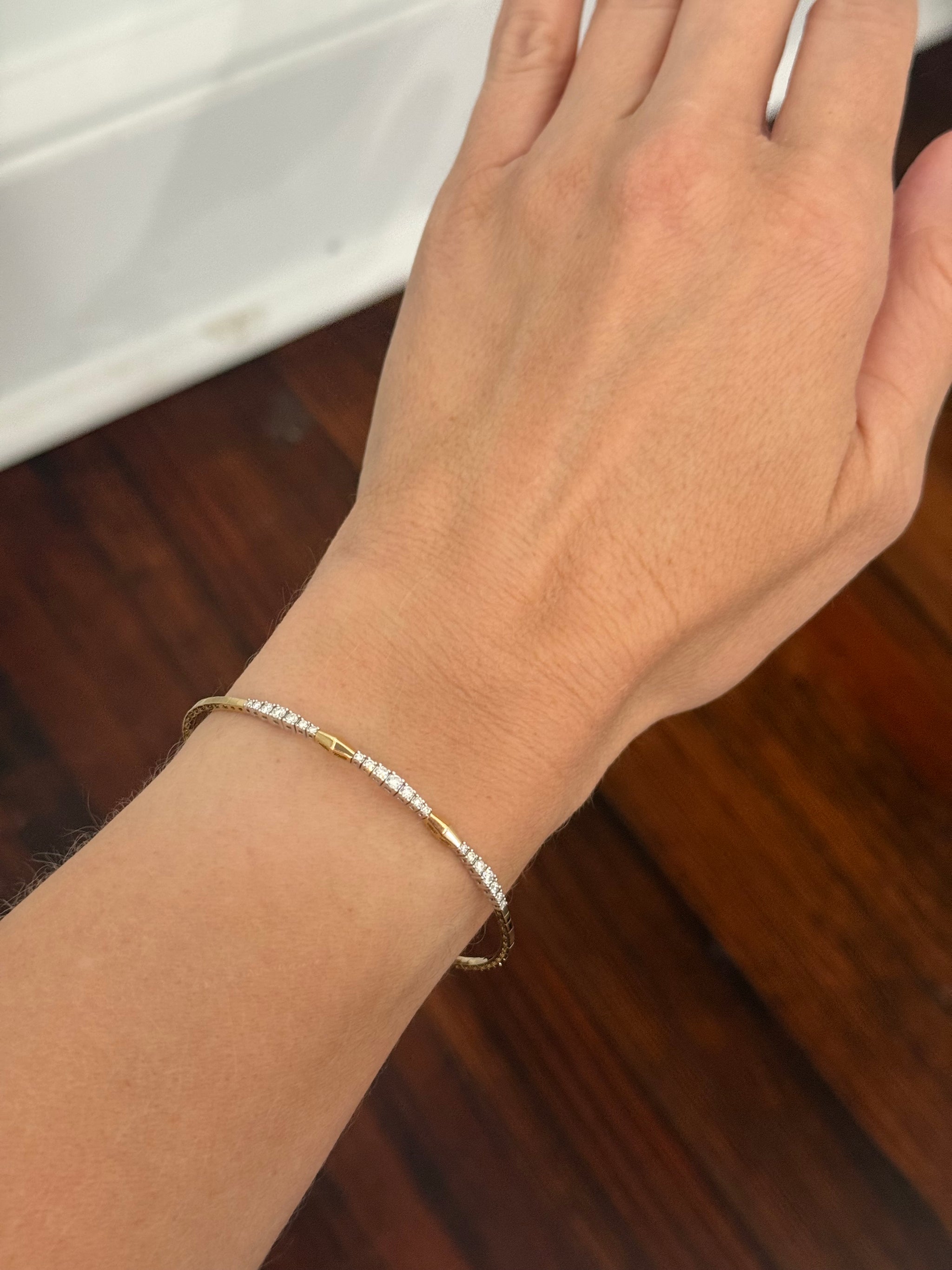 Yellow gold lab diamond flex bracelet. Lab diamonds are set in white gold.
