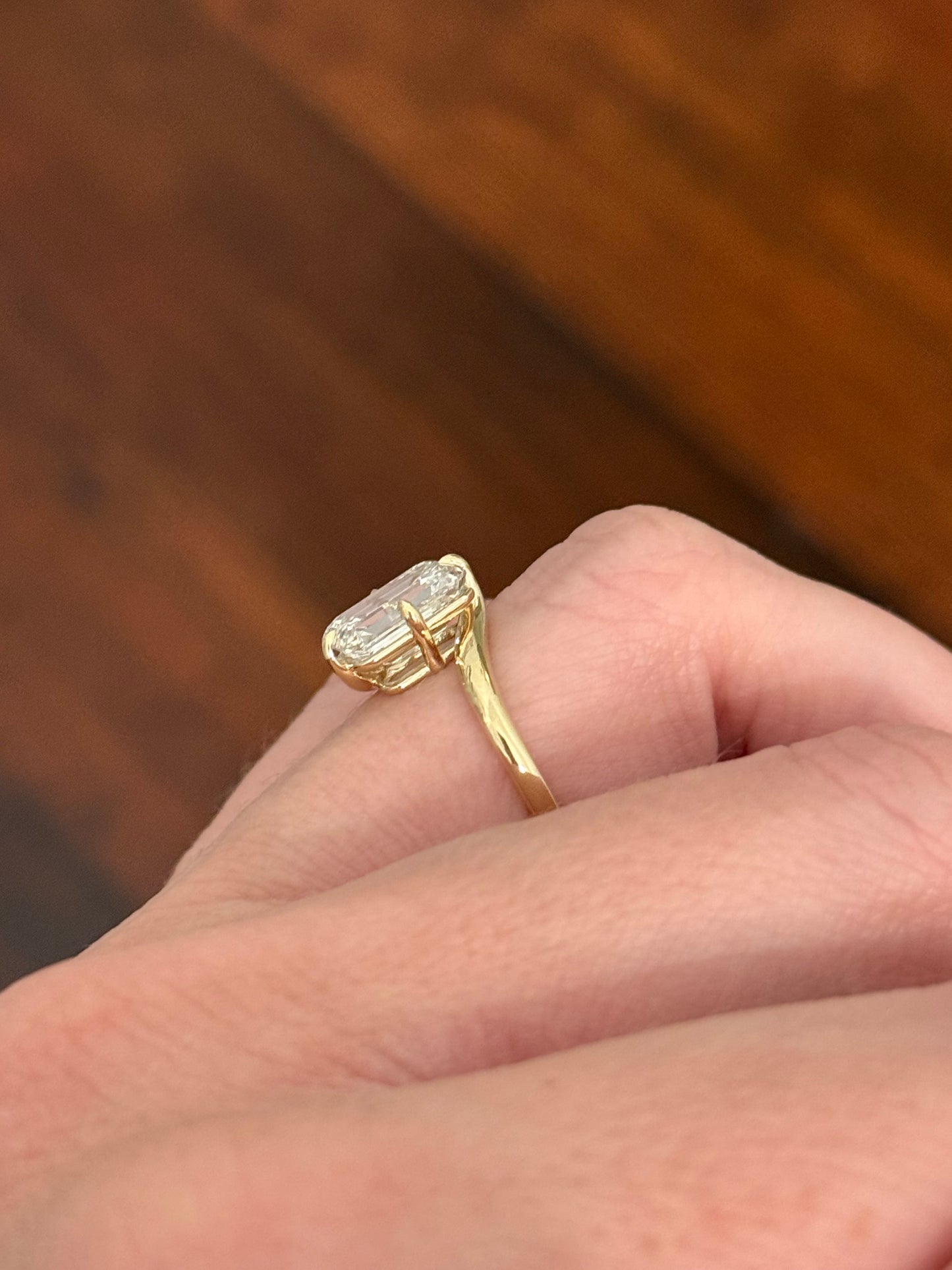 Yellow gold IGI certified 3.03ct emerald cut lab diamond ring