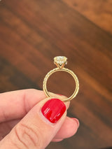 Yellow gold oval lab diamond ring. Center stone is IGI certified and 3.02cts E VVS2