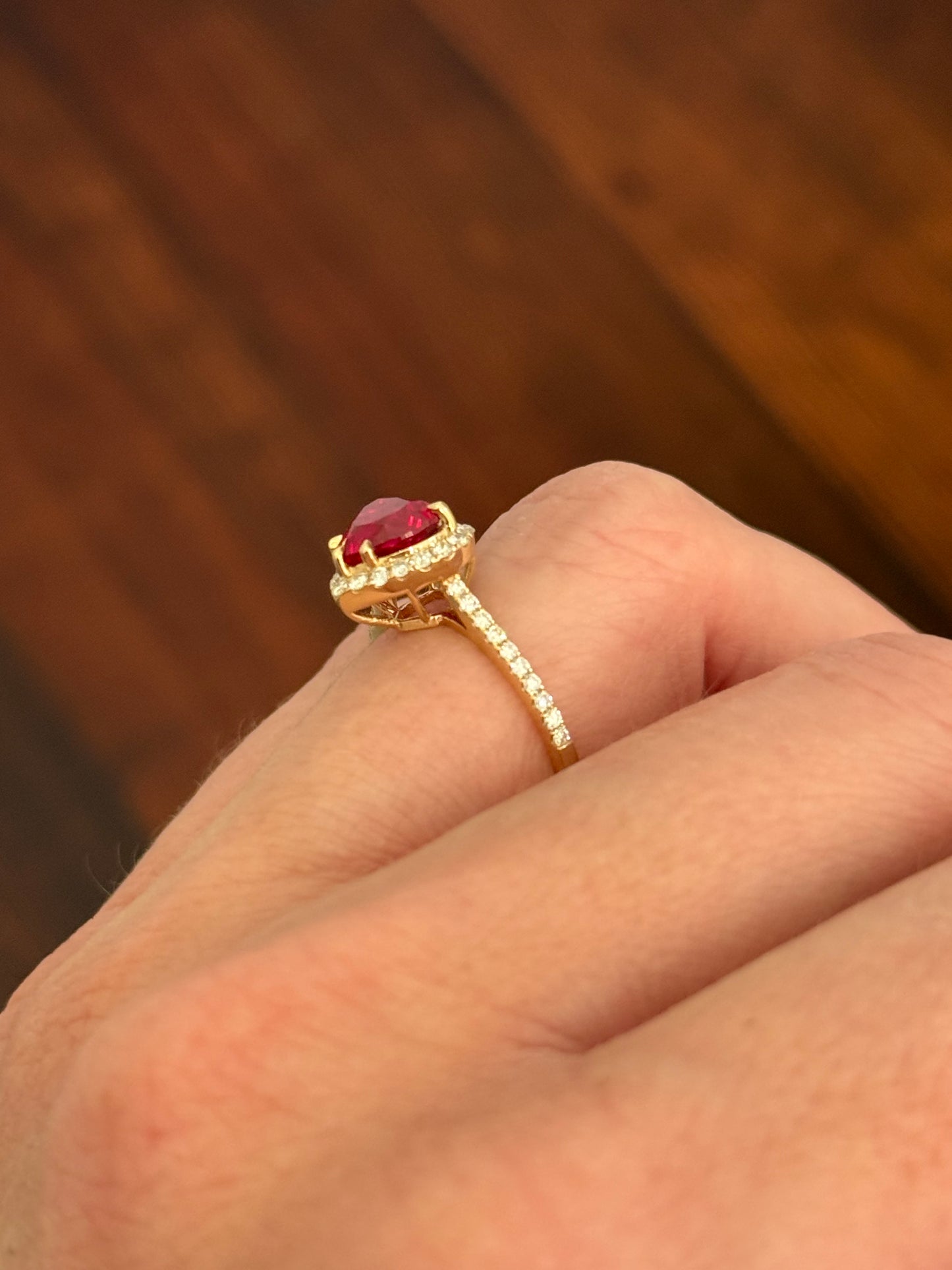 Yellow gold heart shape lab ruby and round lab diamond ring