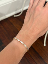 Yellow gold with white gold bezel setting 3.84ct baguette and round natural diamond bracelet