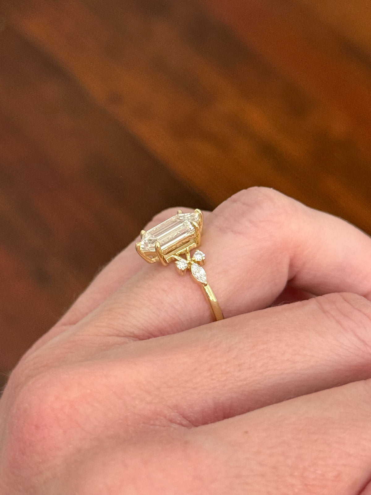 Yellow gold IGI certified 2.69ct step cut duchess cut lab diamond and marquise and round lab diamond ring. Duchess cut measures 12.69x6.28x4.05mm