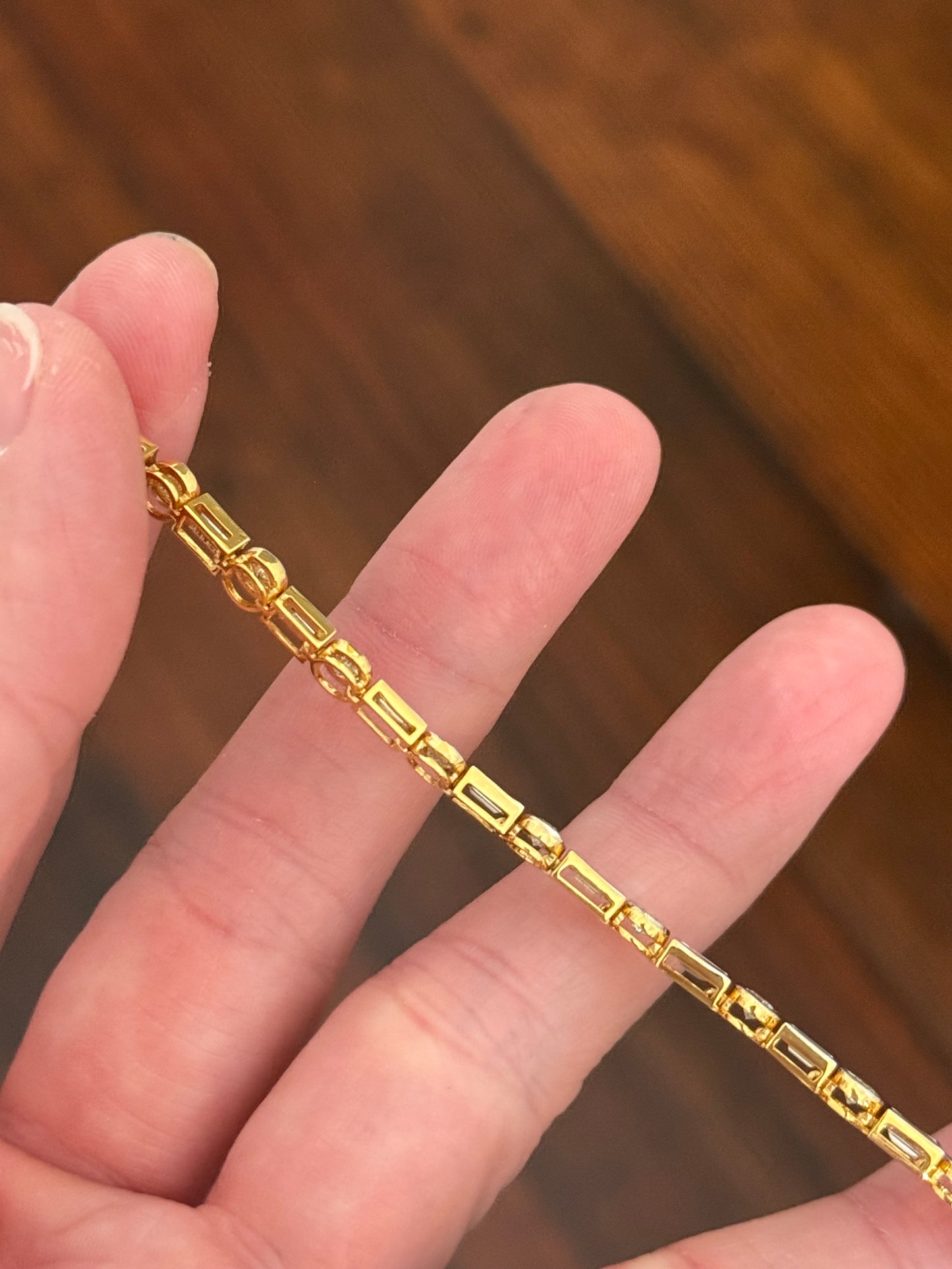 Yellow gold with white gold bezel setting 4.85ct baguette and round natural diamond bracelet