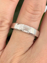White gold 1.2ct emerald cut lab diamond band. Emerald cut measures approximately 6.5x4mm