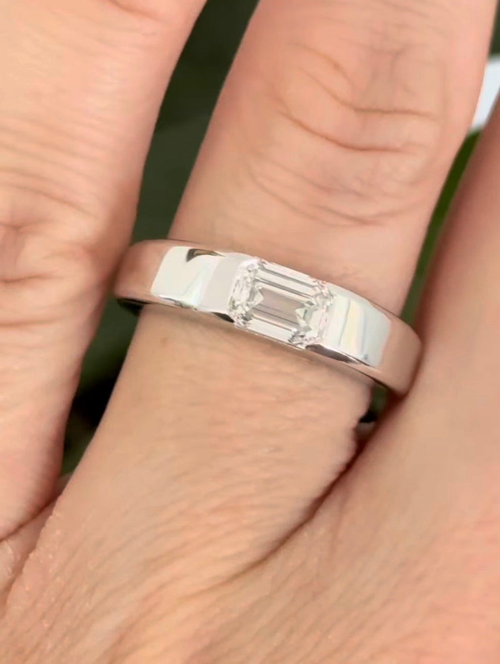 White gold 1.2ct emerald cut lab diamond band. Emerald cut measures approximately 6.5x4mm