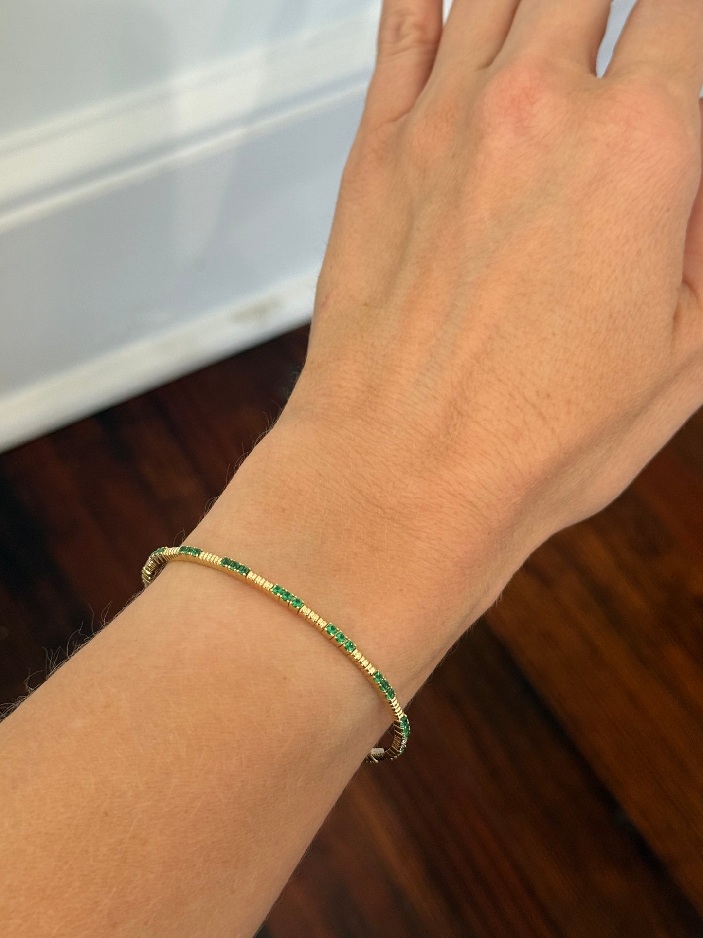 Yellow gold emerald flex bracelet