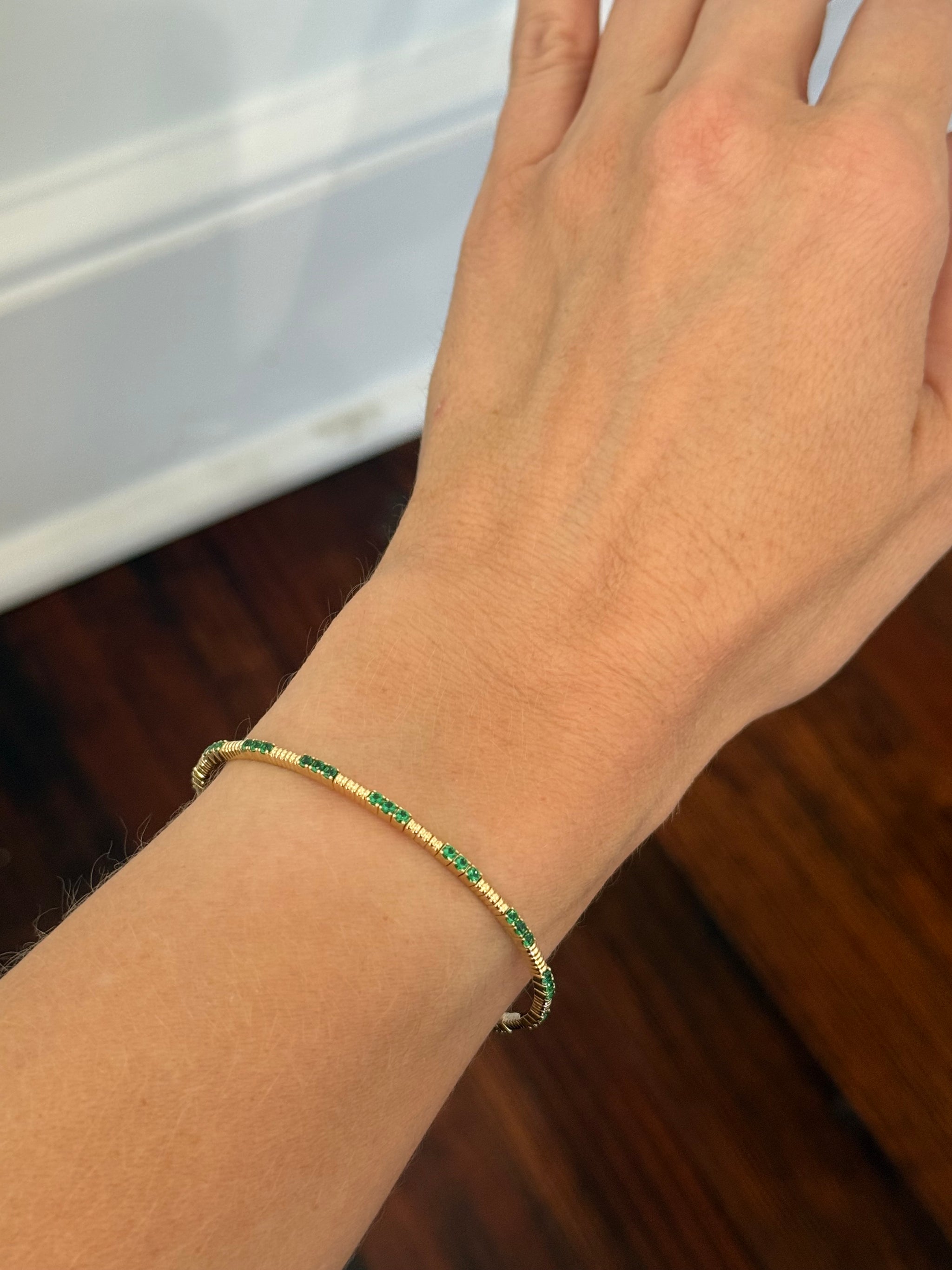 Yellow gold emerald flex bracelet