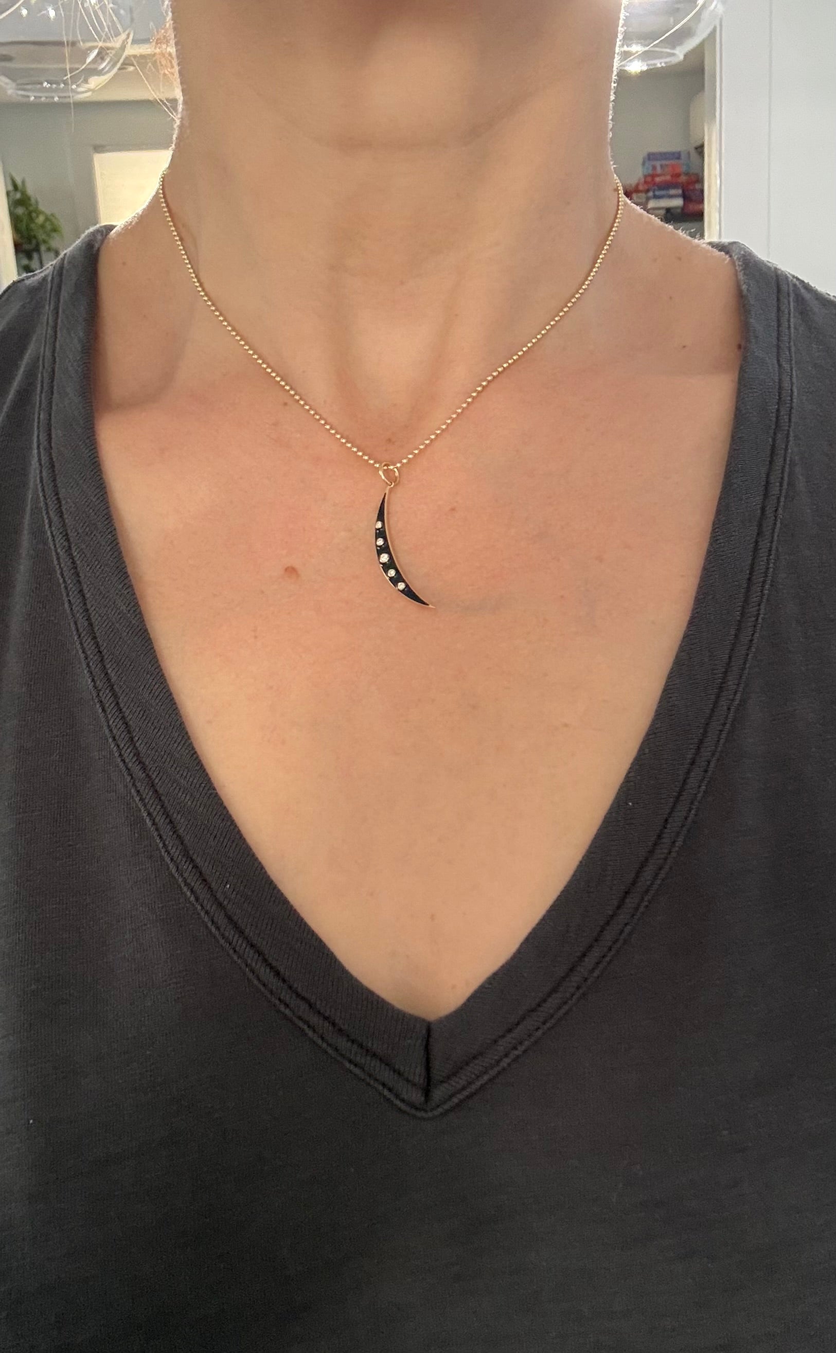 Yellow gold natural diamond and enamel crescent pendants