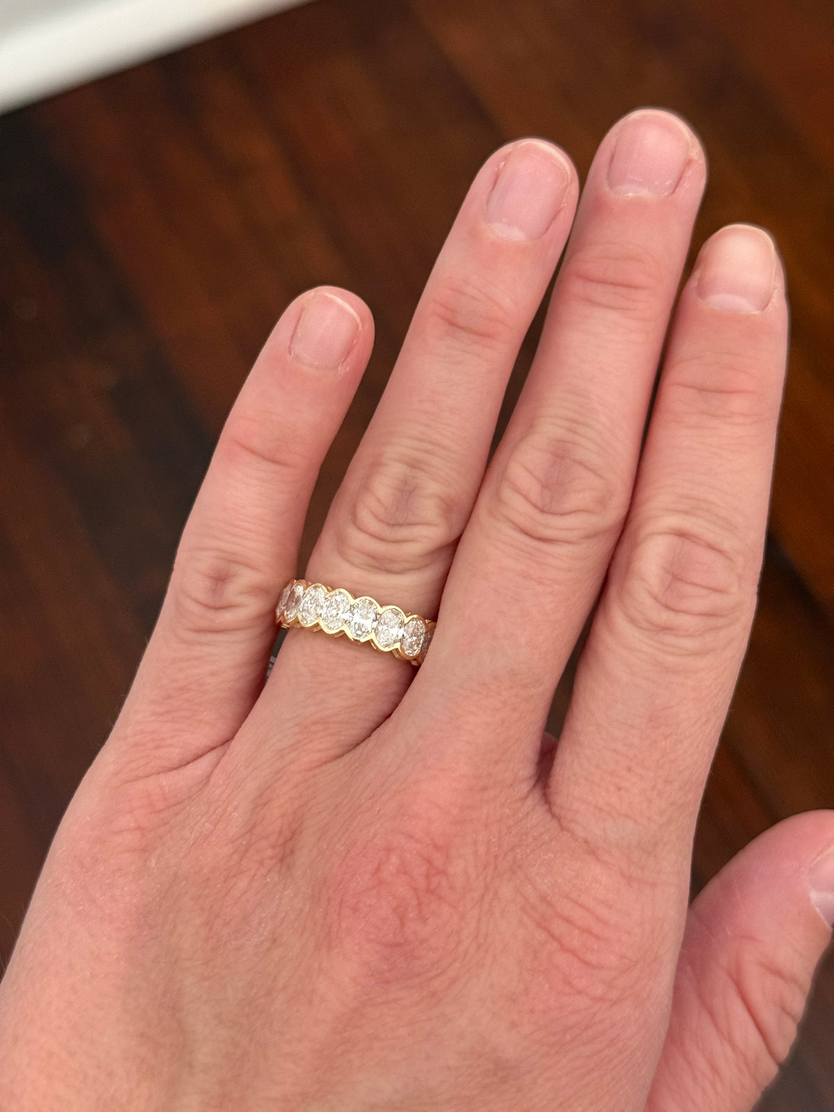 IGI certified 5.14ct oval lab diamond half bezel set eternity band