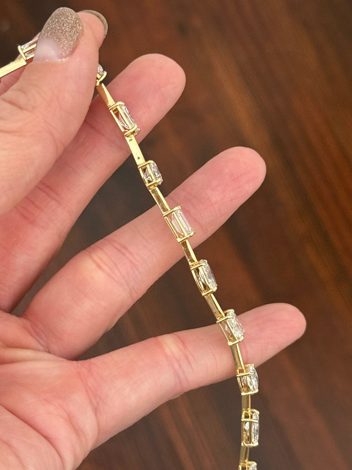IGI certified Yellow gold mixed shape bracelet with 13.87cts of oval, round, radiant, heart shape, emerald and cushion cut lab diamonds