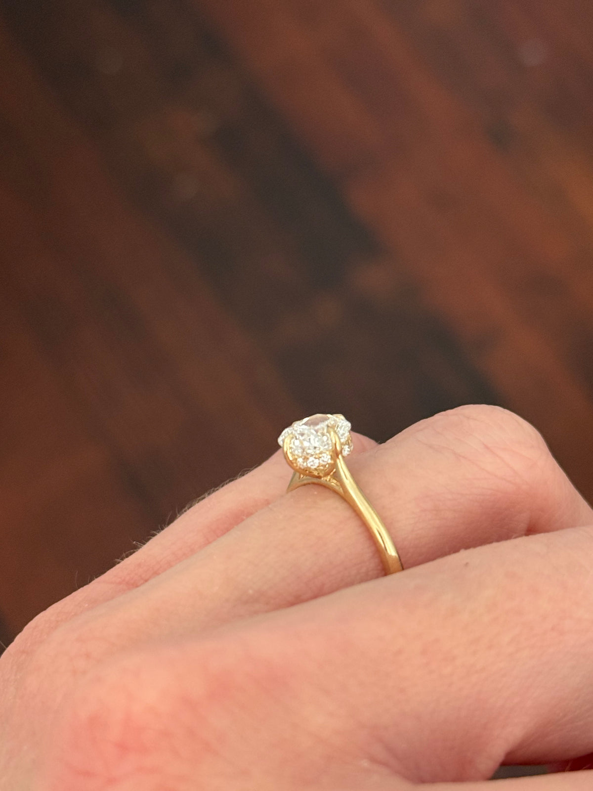 IGI certified yellow gold cushion and round lab diamond ring. Center stone is 1.57cts