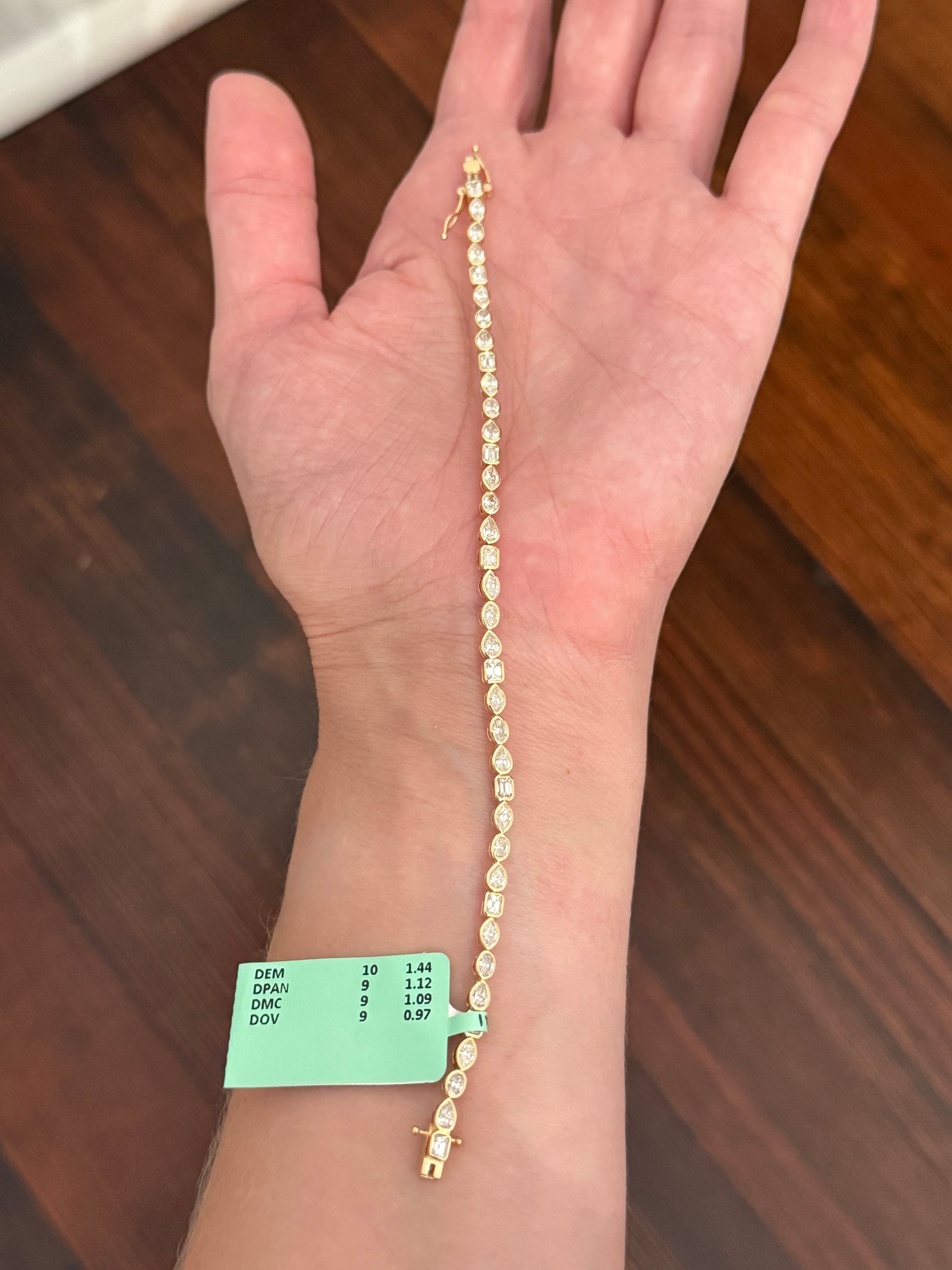 Yellow gold bezel set 4.62cts oval, marquise, pear shape and emerald cut natural diamond bracelet