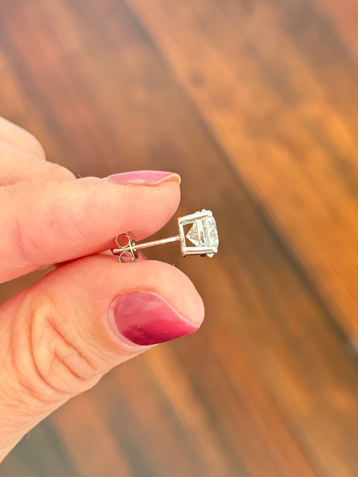White gold 4 prong basket setting 4.15ct round lab diamond stud earrings with a push back