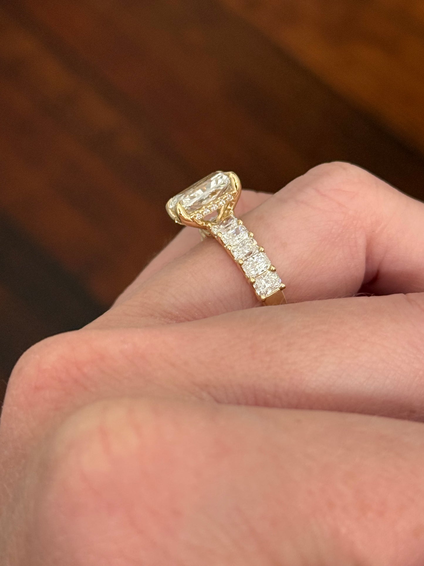 Yellow gold radiant lab diamond ring. Center stone is IGI certified and 3.01cts E VVS2