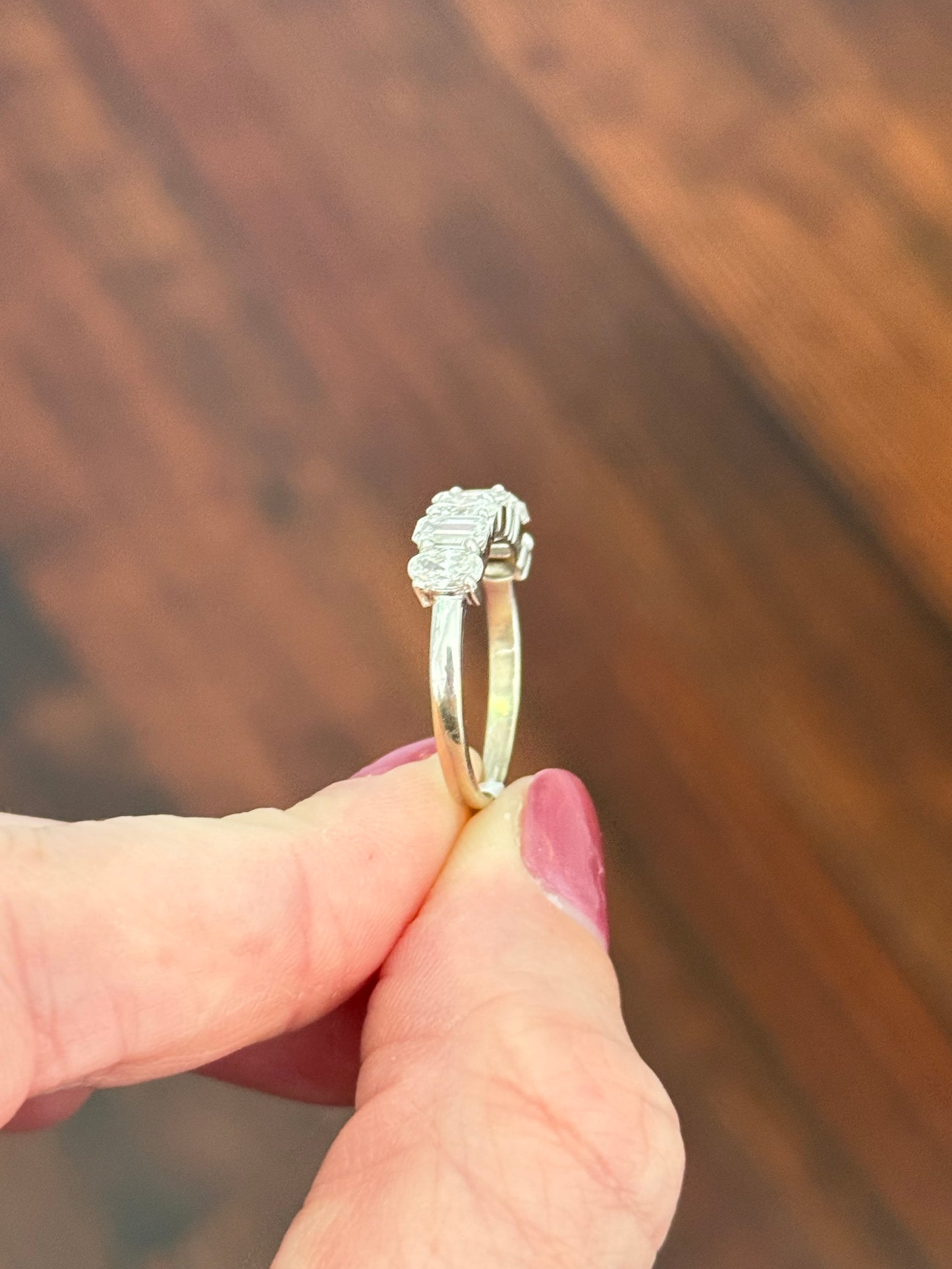 White gold emerald cut and oval lab diamond band