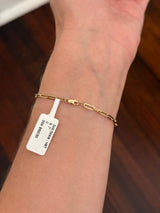 Yellow gold paperclip 3.02ct emerald cut lab diamond bracelet. Emerald cut measures 9.90x6.75mm