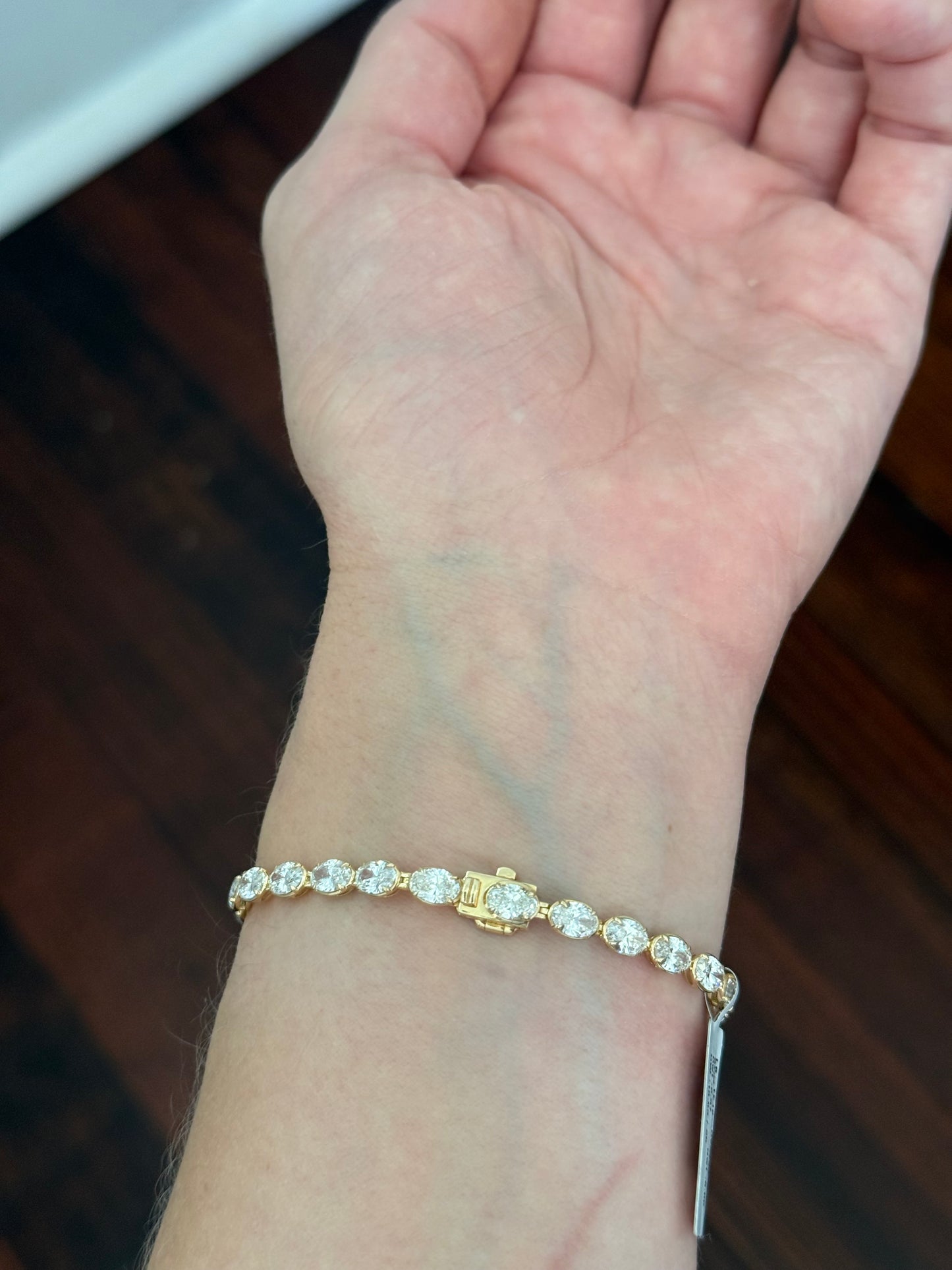 Yellow gold east west set 10.03ct oval lab diamond bracelet