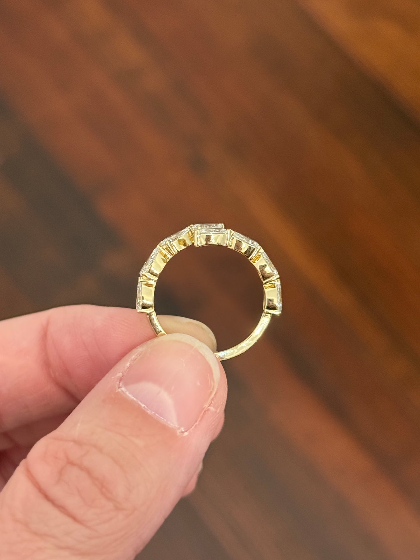 Yellow gold pear shape lab diamond bypass ring