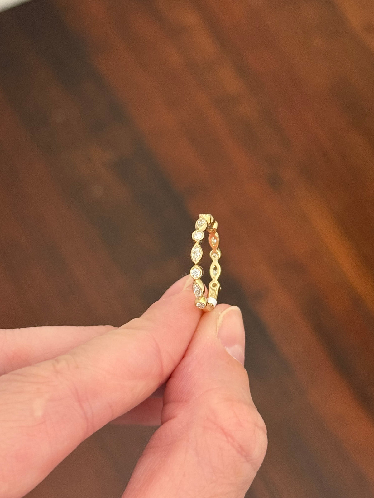 Yellow gold bezel set marquise and round lab diamond band