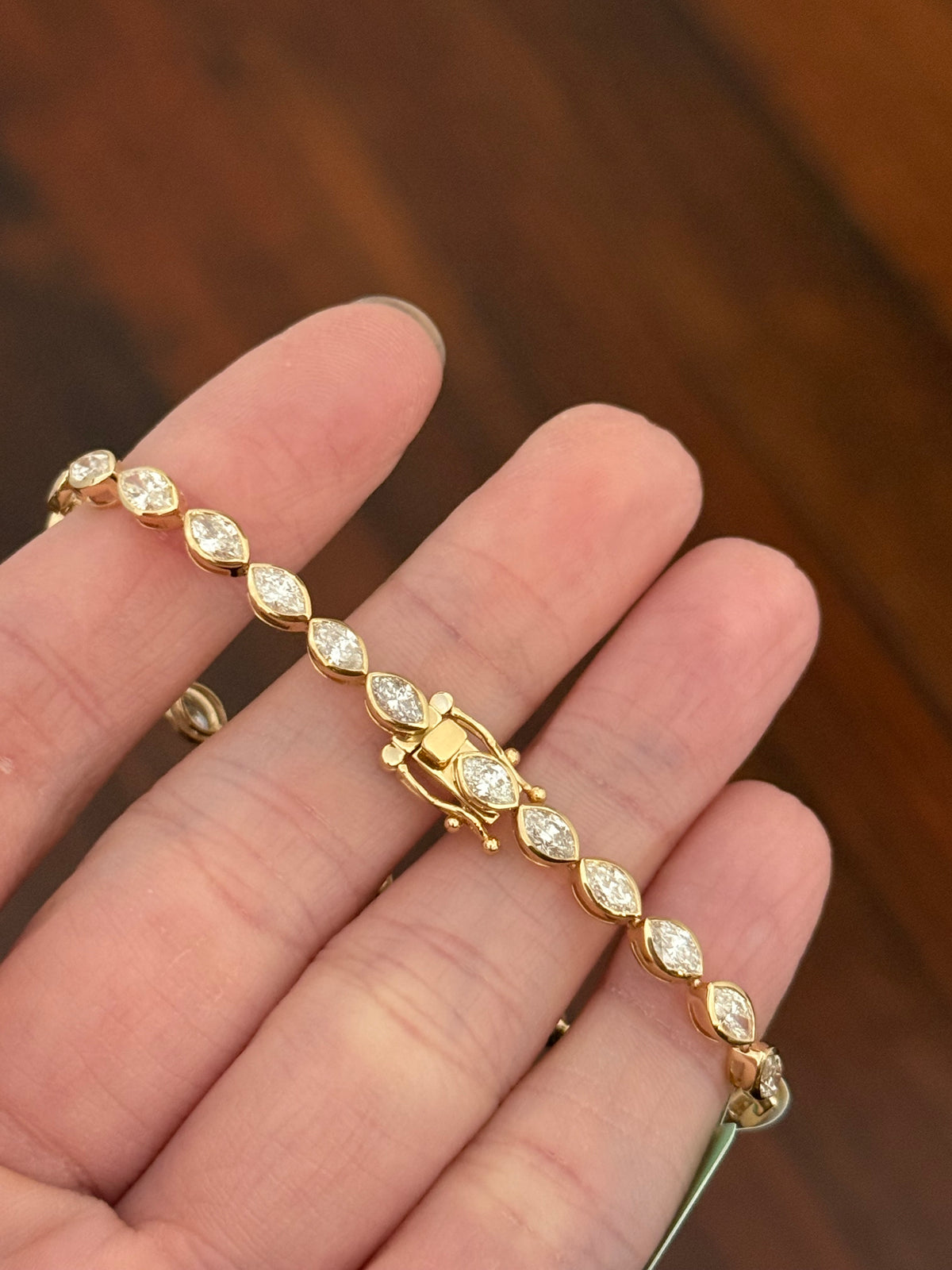 Yellow gold bezel set 5.21ct marquise natural diamond bracelet
