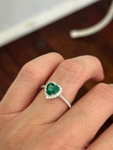 White gold heart shaped lab emerald and round lab diamond ring