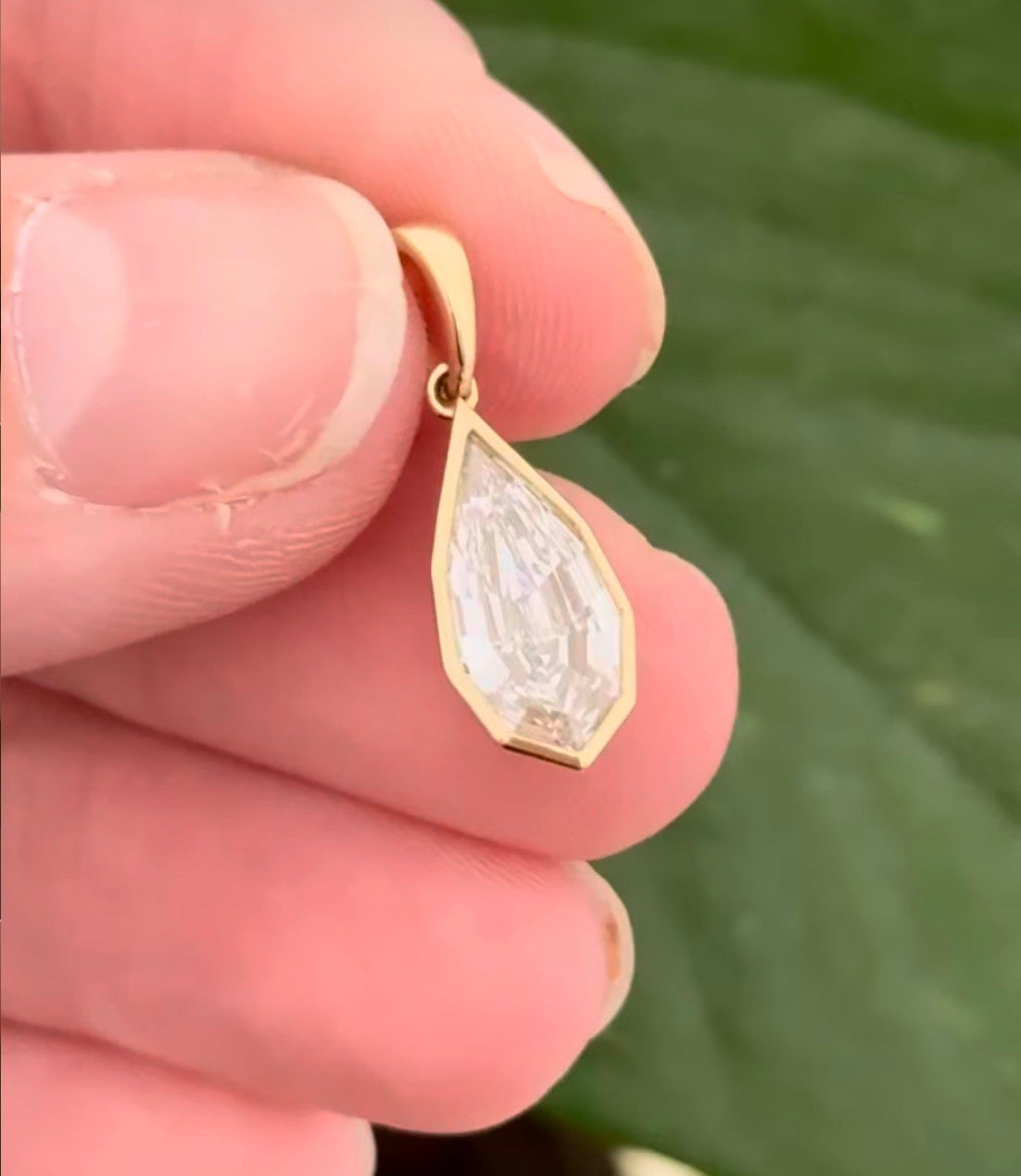 Yellow gold bezel set 1.78ct step cut pear lab diamond pendant