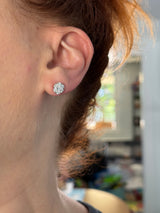 White gold .99ct lab diamond flower studs with screw backs. Includes IDT Certificate.