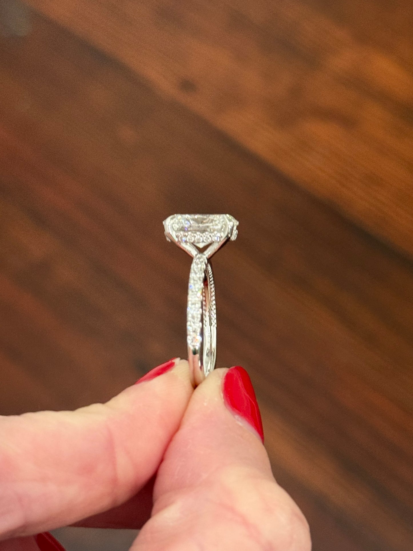 White gold oval lab diamond ring. Center stone is IGI certified and 3.03cts E VVS2